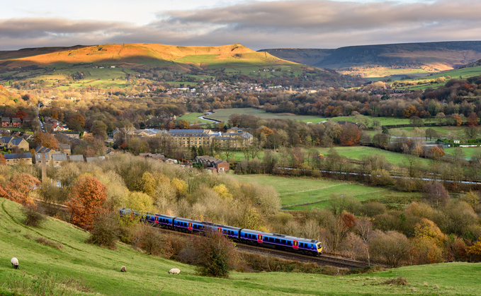 Passenger train passing through countryside near greater Manchester, England | Credit: iStock Passenger train passing through countryside near greater Manchester, England | Credit: iStock